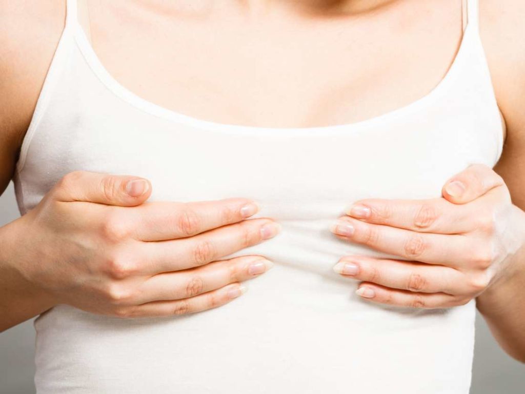 Болять груди при грудному вигодовуванні: причини, симптоми, лікування
