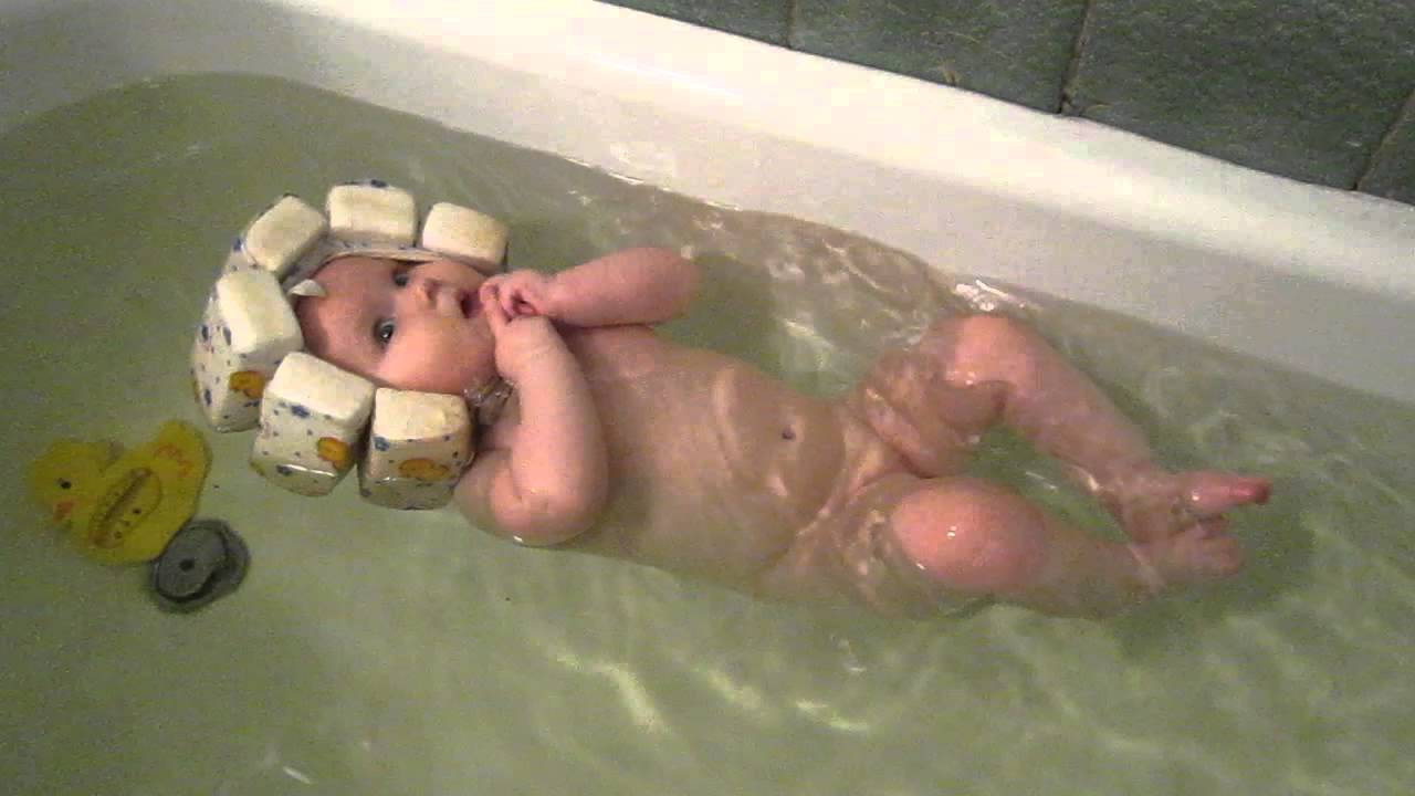 Шапочка для купання немовлят: призначення та різновиди, правила вибору