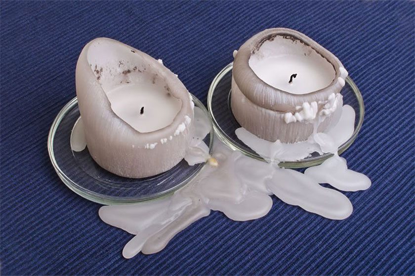 10 методів: як прибрати віск від свічки з одягу та інших поверхонь
